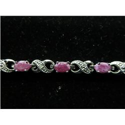 6 CT diamond & ruby infinity style bracelet