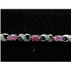 Image 1 : 6 CT diamond & ruby infinity style bracelet
