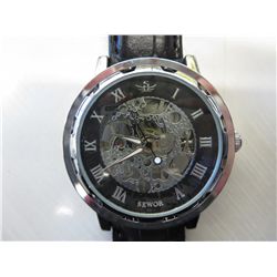 Man's windup Breitling style skeleton watch