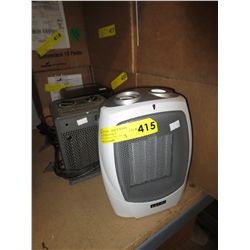 3 Small electric heaters. Used