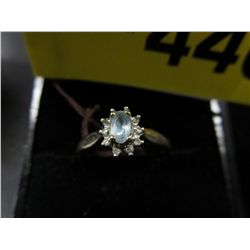 10kt Yellow gold - Blue Topaz & Diamond ring