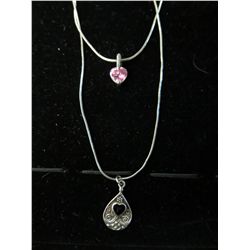 2 Sterling silver chains with pendants