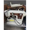 Image 1 : Janome portable sewing machine with case.