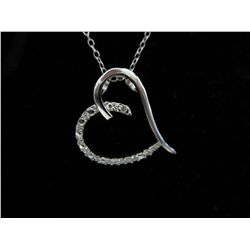 Diamond heart necklace set in sterling silver