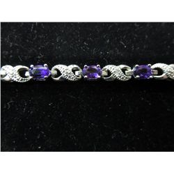 Amethyst & diamond infinity style bracelet
