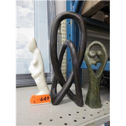 3 Carved stone statues