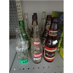 12 Vintage beverage bottles