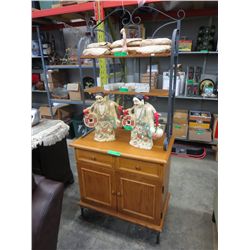 Kitchen storage cupboard with baker's style shelf