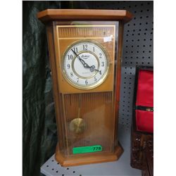 Fisher pendulum wall clock