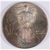 Image 1 : 1995 AMERICAN SILVER EAGLE, MONSTER RAINBOW TONING ON THE OBVERSE