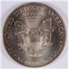 Image 2 : 1995 AMERICAN SILVER EAGLE, MONSTER RAINBOW TONING ON THE OBVERSE