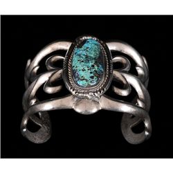 Navajo Sand Cast Silver and Carico Lake Turquoise Bracelet 130 GMS 6 1/4" L. 2 1/4" W. 1 5/8" W. Gap