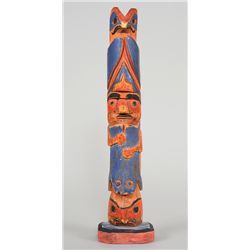 Northwest Coast Totem Carved with Four Figures ca. 1910  12 1/2" H. 3" W. Base  Good Condition