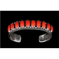 Navajo Silver and Red Coral Bracelet Stamped TM 72.3 GMS 5 1/2" L. 1/2" W. 1 1/8" W. Gap  Fine Condi