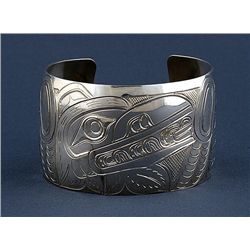 Kwakwaka'wakw Silver Bracelet with Incised Raven Design by William Cook 6 1/4" L. 1 1/2" W. 1 1/8" W