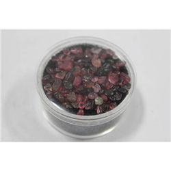 CONTAINER OF BERMISE GEMSTONES