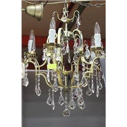 CRYSTAL CHANDELIER IN SOLID ANTIQUE BRASS