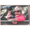 Image 1 : Burt Reynolds signed 11x14 from the movie Smokey and the Bandit