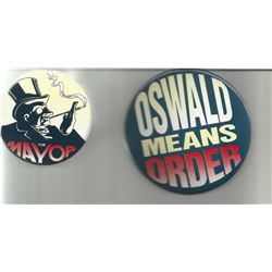 Batman Begins pair of prop buttons for the Penguins run at the mayors office one large one says Oswa