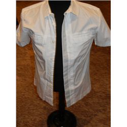 Hunger Games white shirt worn by one of the game controllers,  it has faint marks from various actor