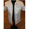 Image 1 : Hunger Games white shirt worn by one of the game controllers,  it has faint marks from various actor