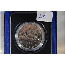 1975 Canada dollar coin in blue case.