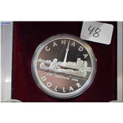 1984 Canadian cased silver dollar coin commemorating Toronto's 50 years