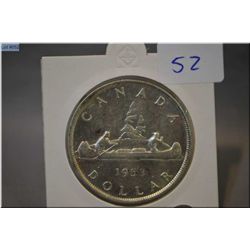 1953 Canada silver dollar coin in protector