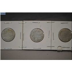 Five Canadian silver quarters
