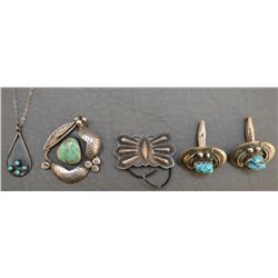FOUR PIECES OF NAVAJO SILVER JEWELRY