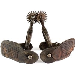 Star stamped iron spurs by August Buermann