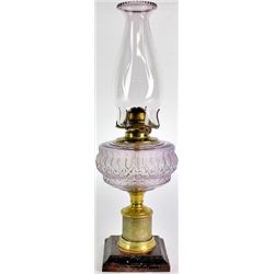 Antique kerosene lamp with glass font, burner