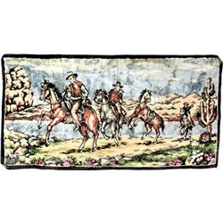 Vintage velour tapestry of cowboys on horseback