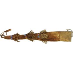 Fringed and beaded rifle scabbard on moose