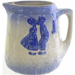 Antique stoneware pitcher with dutch scene