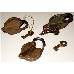 Three heart shaped Yale railroad locks