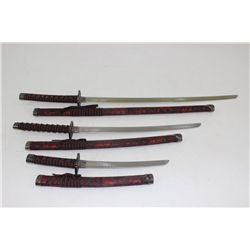 3 Swords in Sheathes