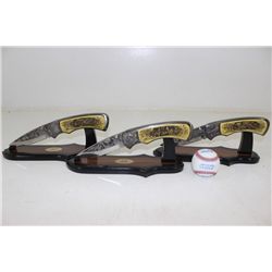 3 Oversized Pocket Knives on Stands