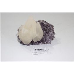 Calcite Crystal on Amethyst Crystals