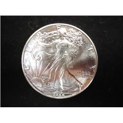 1988 AMERICAN SILVER EAGLE (UNC) SOME TONING ON