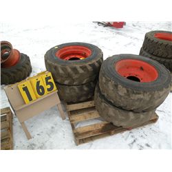 qty 4 used 10/16.5 Bobcat tires & rims