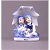Image 1 : Dutch ceramic figurine of children under a umbrella.