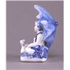 Image 4 : Dutch ceramic figurine of children under a umbrella.