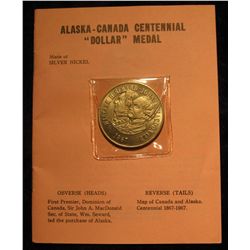 325. 1867-1967 Alaska-Canada Centennial "Dollar" Medal. Depicts William H.Seward & John Mac Donald. 