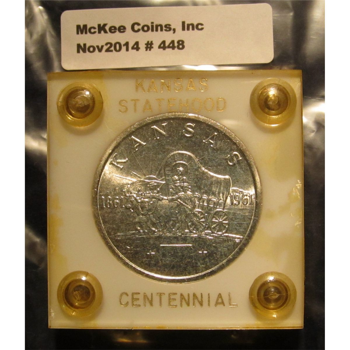 448. "18611961 Kansas", "Statehood Centennial", Silver, Halfdollar size. in a white hard plastic C
