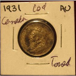 621. 1931 Canada Dime. Fully toned AU.