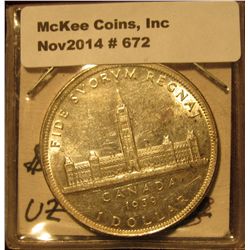 672. 1939 "Parliament" Canada Silver Dollar. AU to Unc.