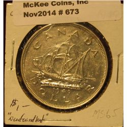 673. 1949 "Newfoundland Canada Silver Dollar depicting John Cabot's ship "The Mathew"". MS 65.