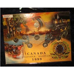 697. 1999 Large Framable holder with 12-Piece Canada Millenium Quarter Set in BU.