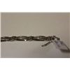 Image 2 : ONE 14KT WHITE GOLD DIAMOND SET LINK DESIGN BRACELET IS CHANNEL SET WITH A TOTAL OF 142 BAGUETTE